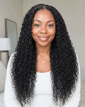 Deep-curly hair moving as the model lifts the curls